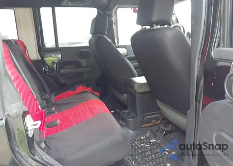 2007 Jeep Wrangler Unlimited Sahara z USA, uszkodzony, nr VIN 1J8GA59187L104774